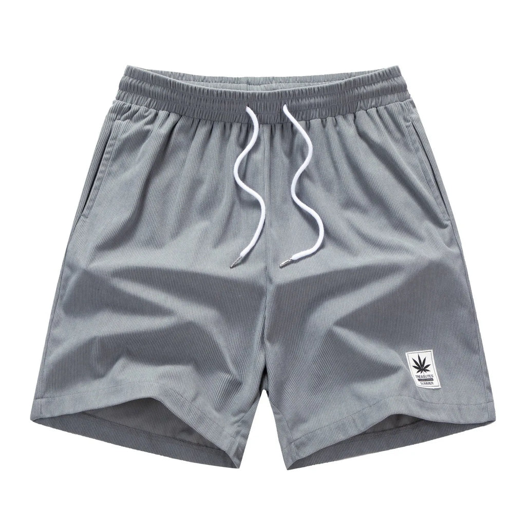 Men's straight cut summer shorts with a drawstring waist in black, blue, gray, or khaki.