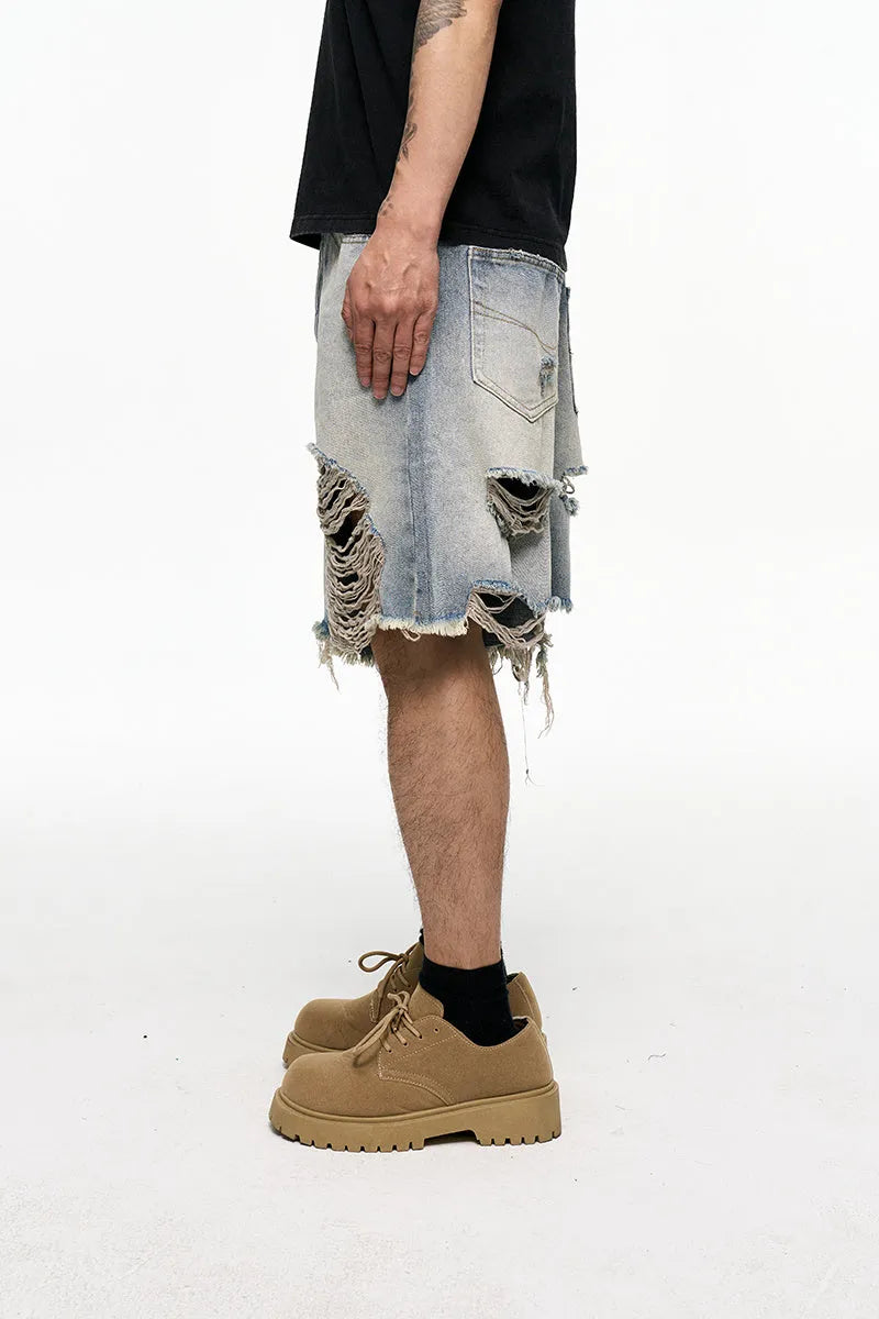 Light blue men's baggy denim shorts with wide leg cut and retro washed finish