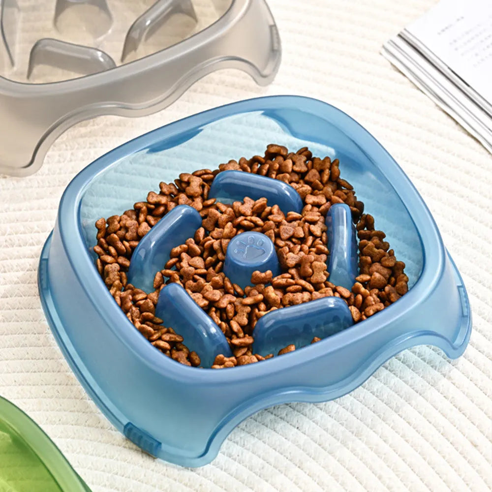 A blue plastic slow feeder dog bowl with a low 4cm profile to prevent fast eating.