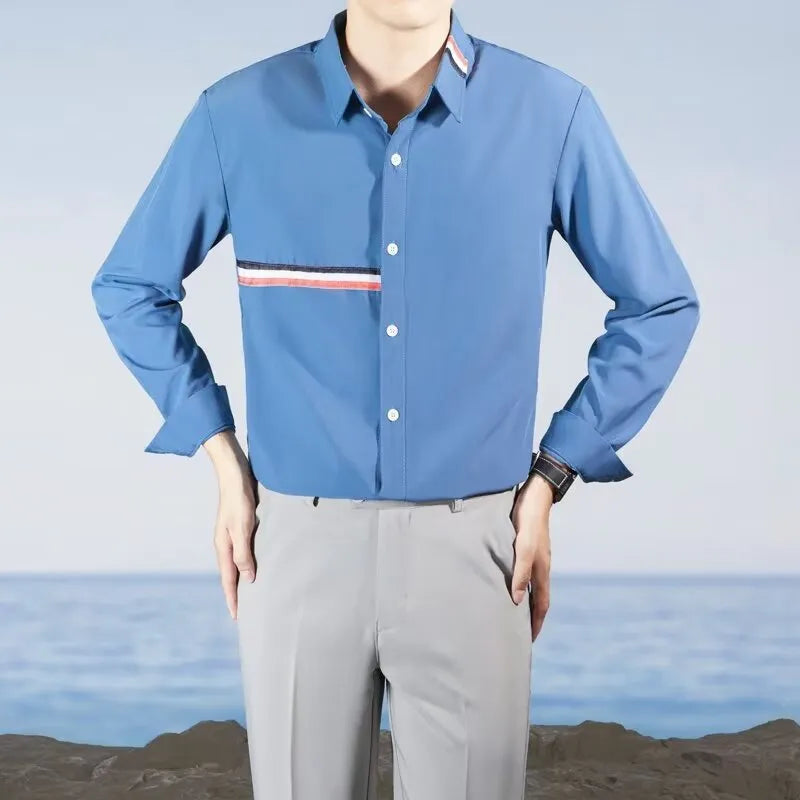 Hong Kong style loose fit shirt cardigan in a cotton blend fabric, shown in a light blue colour.