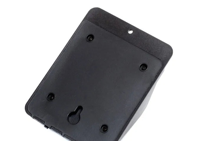 White solar-powered outdoor LED motion sensor light unit mounted on a wall.