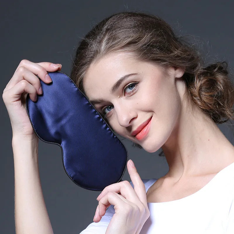 Double-sided mulberry silk eye mask with embroidered print in a choice of colours.