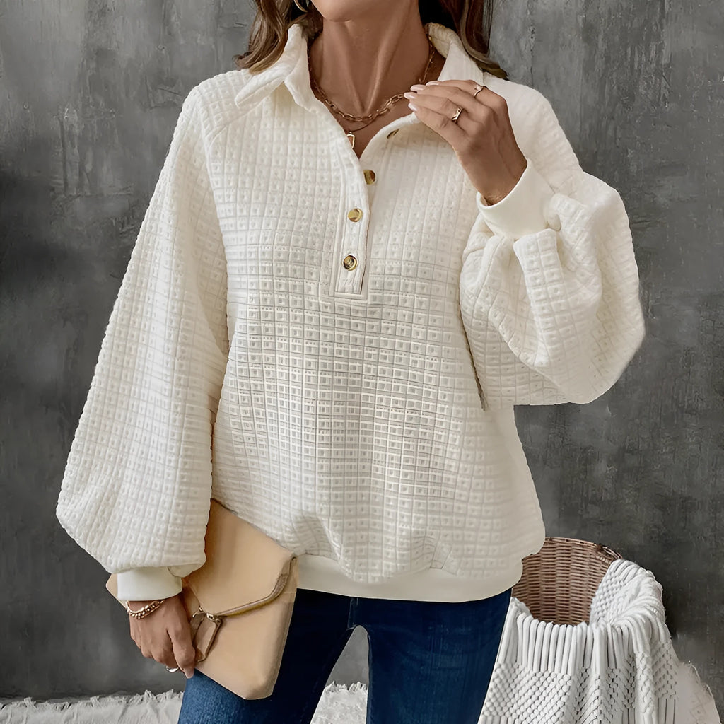 Women's milky white polo collar thickened pullover sweater on a hanger.
