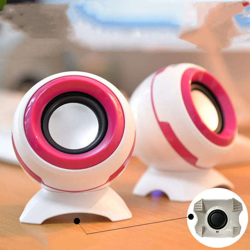 Pair of compact desktop speakers with USB cable and 3.5mm audio connection