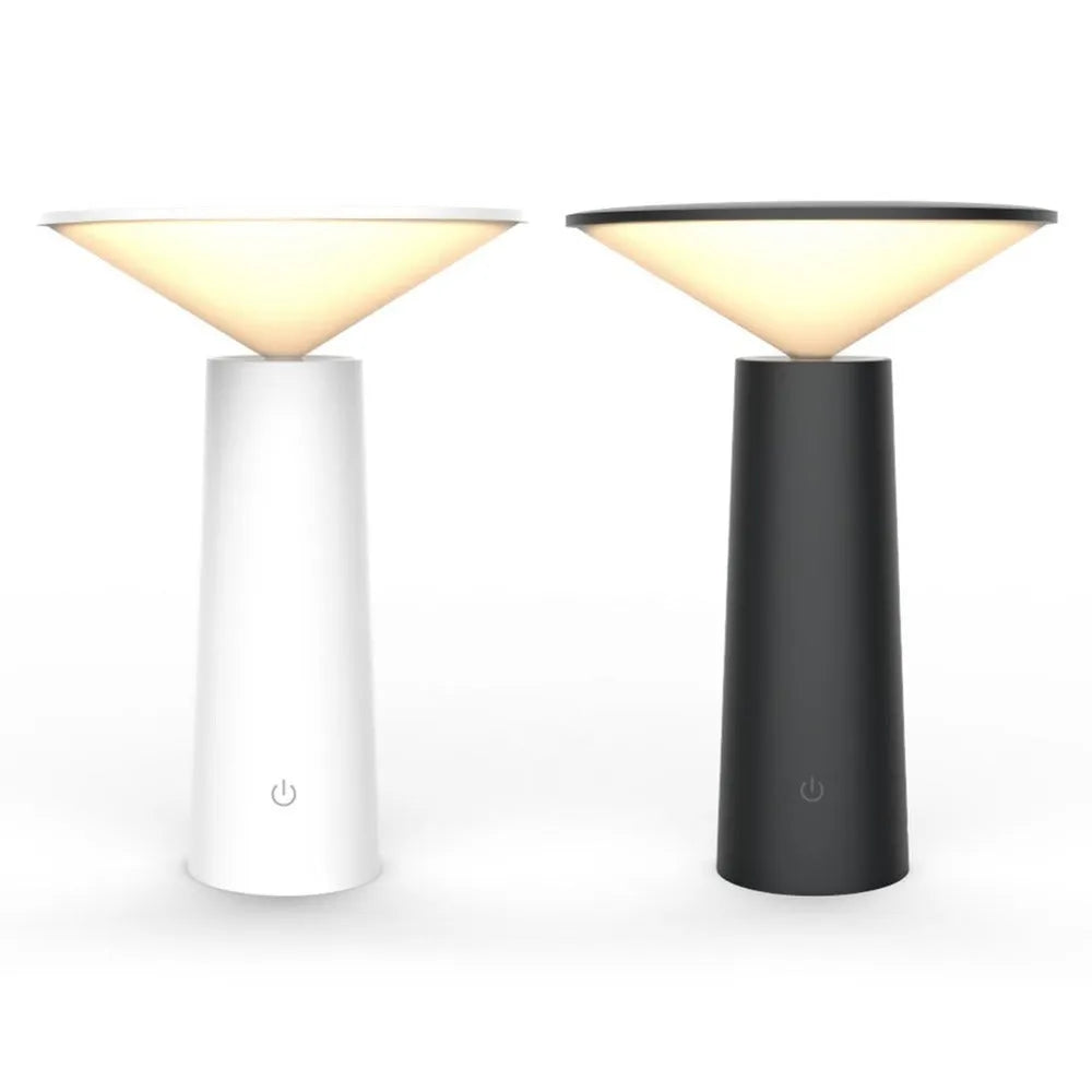 Black USB touch sensor table lamp with adjustable head on a wooden desk