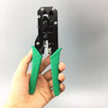 Green dual-purpose crystal head net pliers with tool steel crimping jaws on a white background