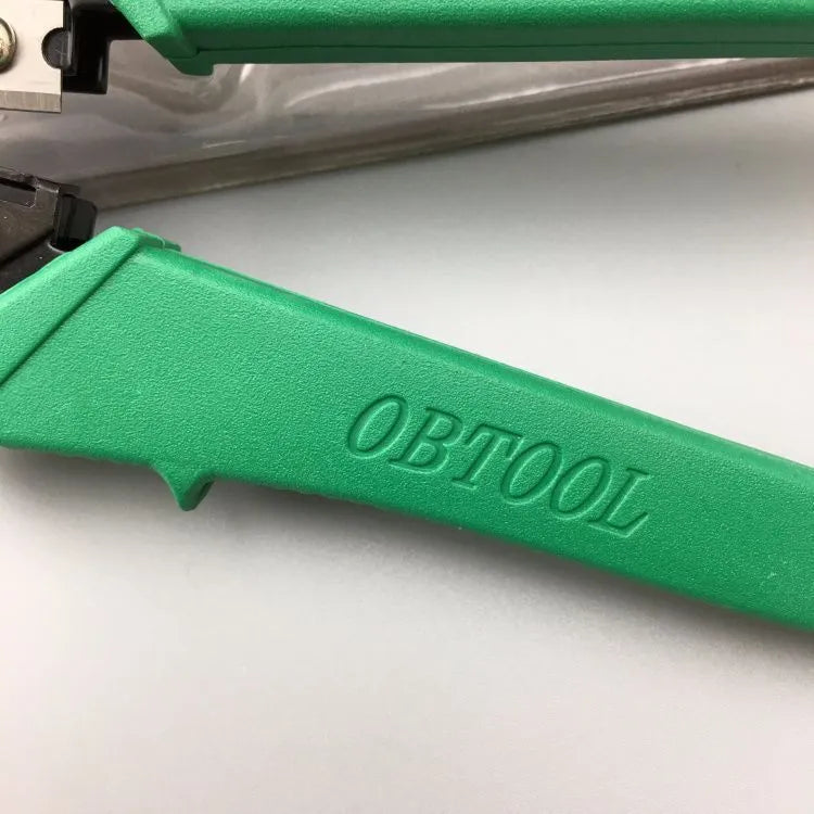 Green dual-purpose crystal head net pliers with tool steel crimping jaws on a white background