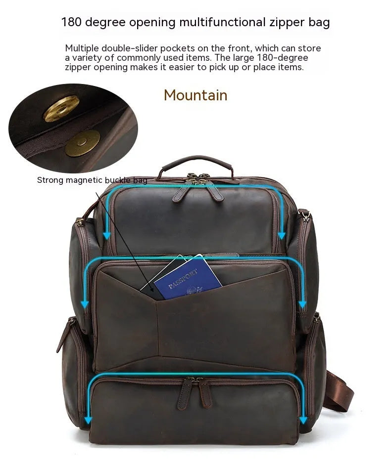Dark brown retro crazy horse leather backpack for men open to show 17-inch laptop compartment and internal organisers.