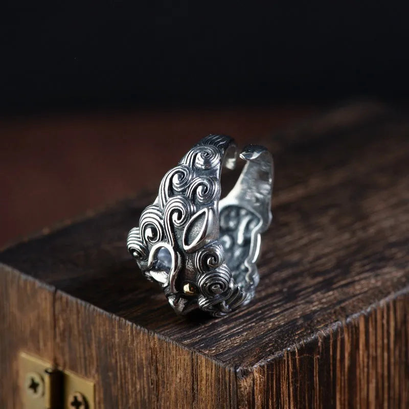 Personalised silver open ring with Jibeast pattern and diamond detailing.