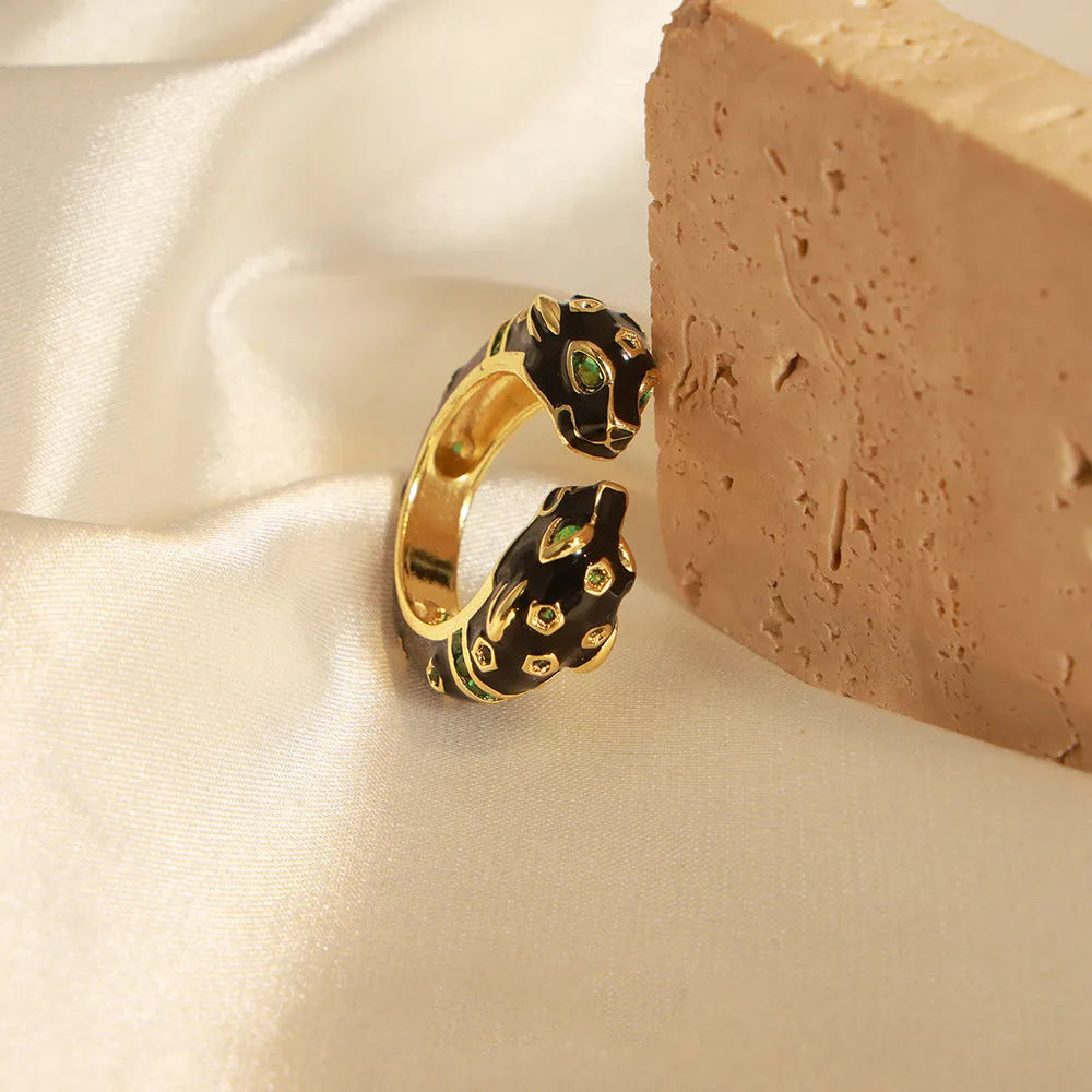 Women's black cheetah print geometric open ring with oil drip effect, size UK 7.