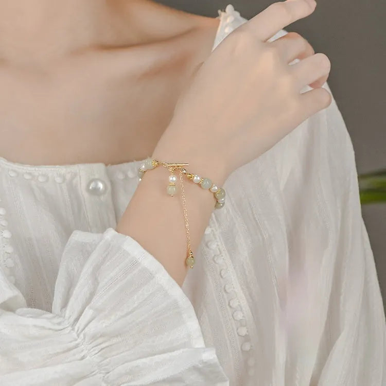 Natural Hetian Jade women's bracelet with pearl pendant and gold electroplated Chinese style design