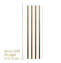 Set of reusable stainless steel straws in straight and bent styles with a cleaning brush on a table.