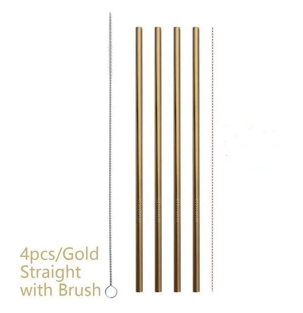 Set of reusable stainless steel straws in straight and bent styles with a cleaning brush on a table.
