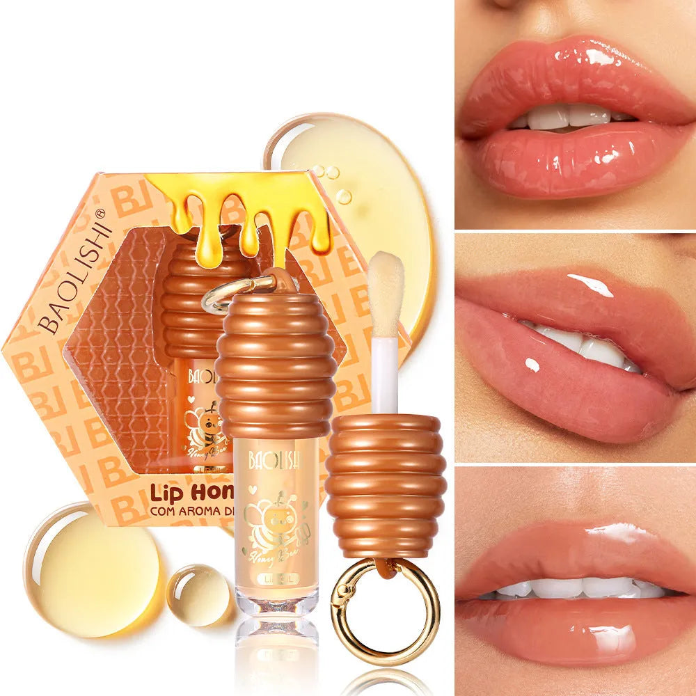 Honey lip gloss keychain with portable pannier bag carrier showing moisturising lip product
