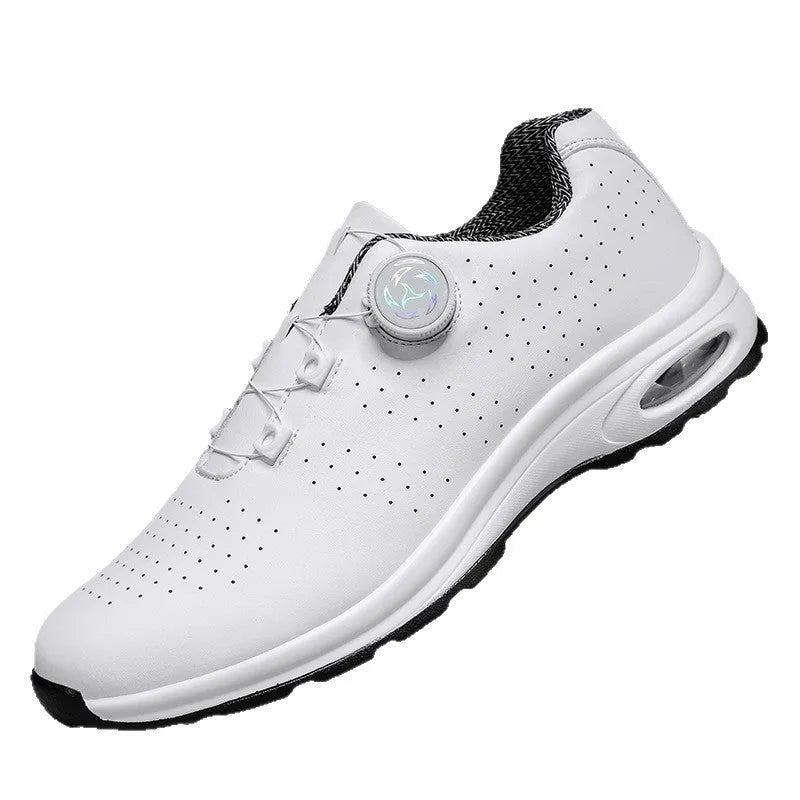 Low-top black and white mesh tennis shoes with cross-strap design and flat composite sole