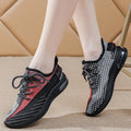 Women's lightweight casual running shoes in purple, black and orange colours with front lace-up design