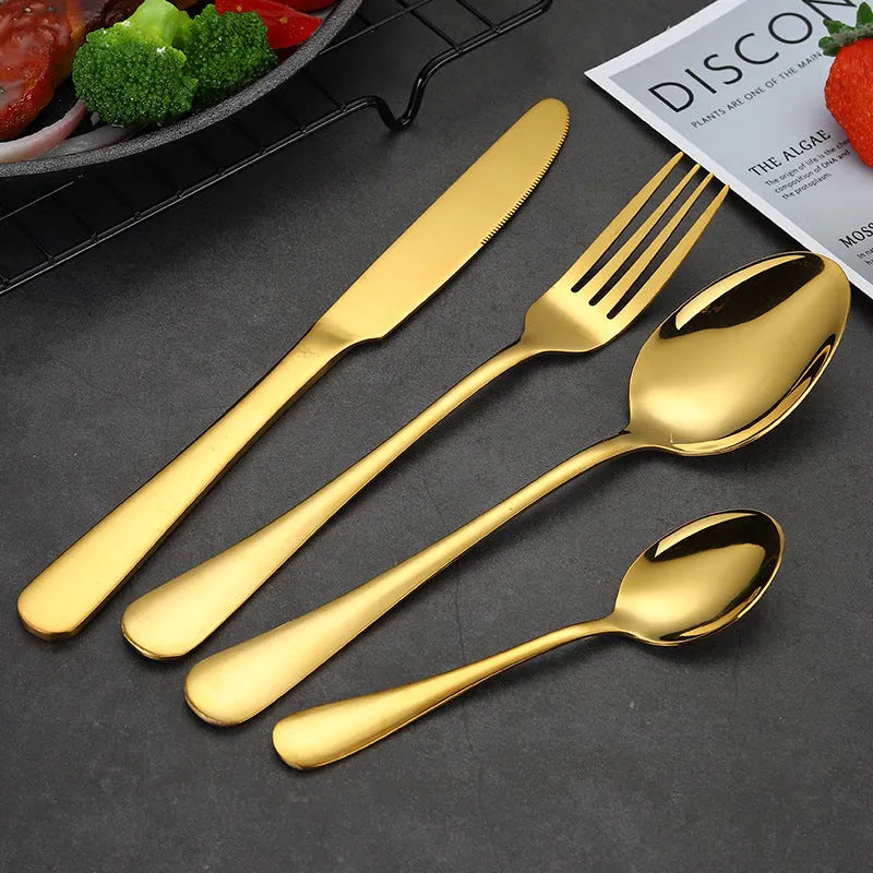 24 piece stainless steel tableware set showing knives, forks, and spoons in multiple colour finishes
