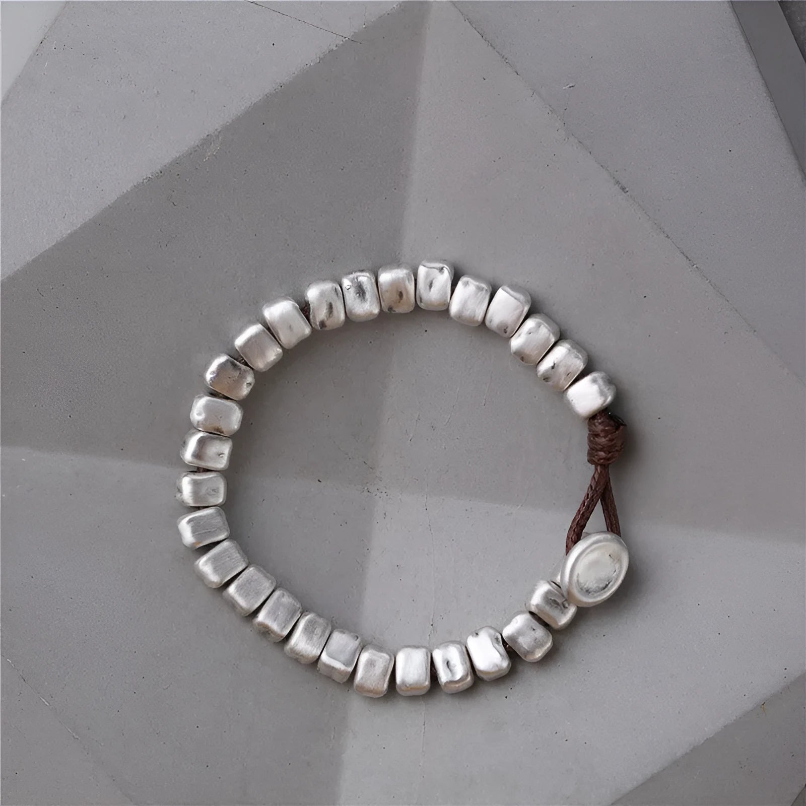 Handmade wooden women's bracelet with silver-coloured irregular square design on elastic band