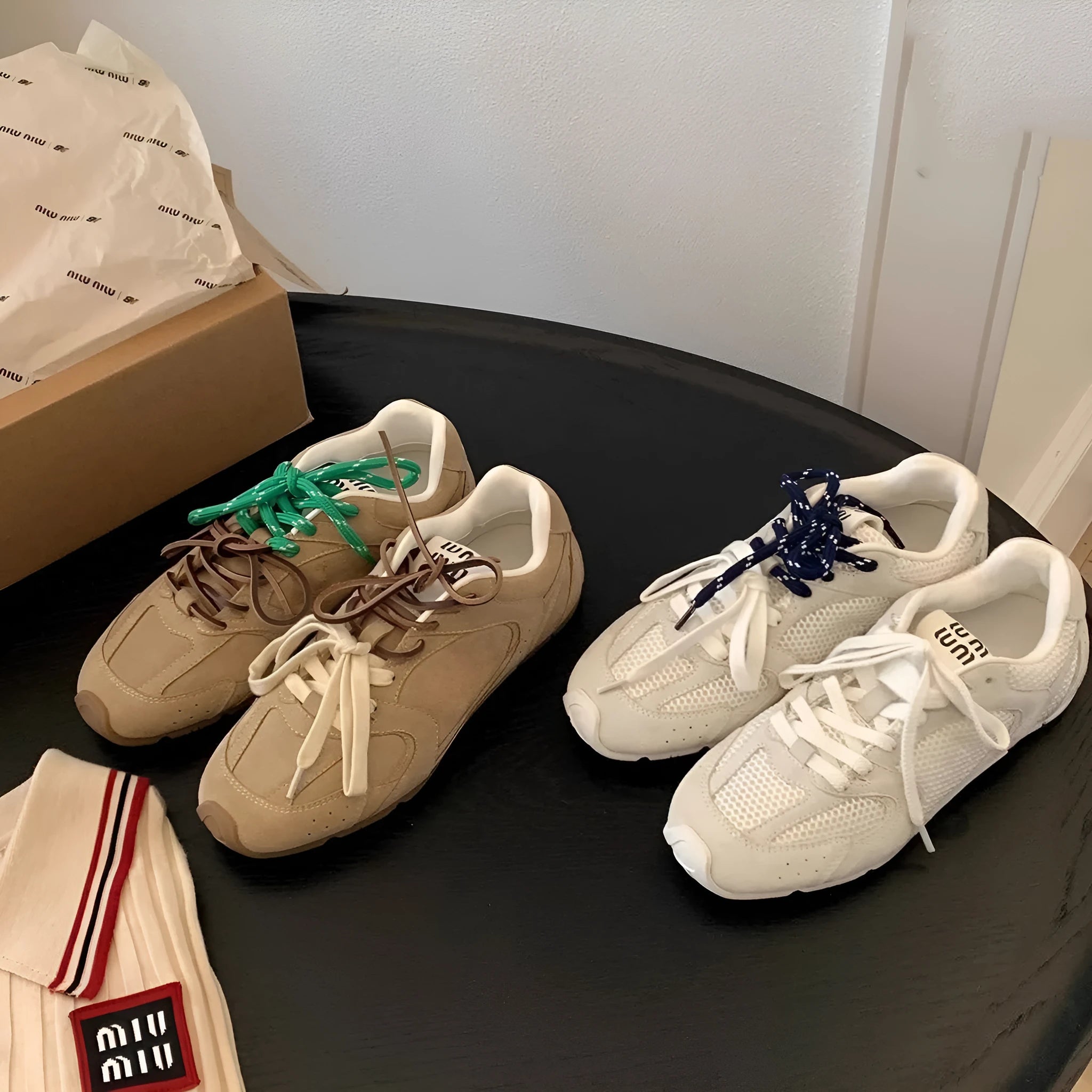 Women's retro German training shoes in milky white with flat heel and front lace-up design.