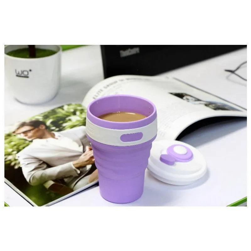Green collapsible silicone travel cup shown both expanded and folded to 6cm height