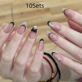 A selection of false nails in various colours and sweet girl style patterns, shown in packs of 5, 10, or 15 sets.