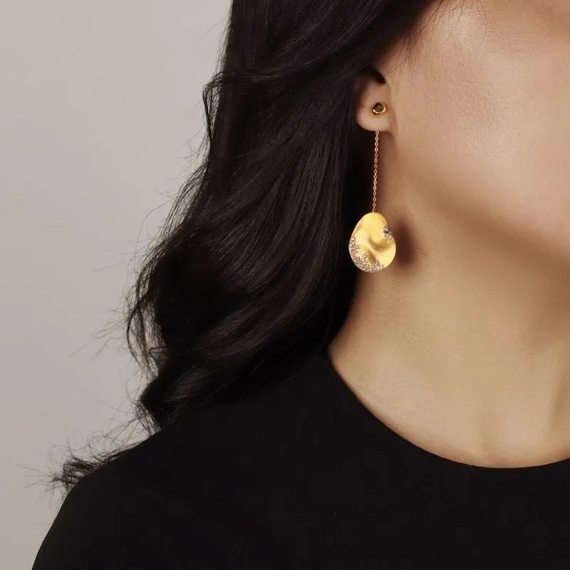 Asymmetric floral women's earrings with zircon stones in gold or silver finish, Chinese style design.