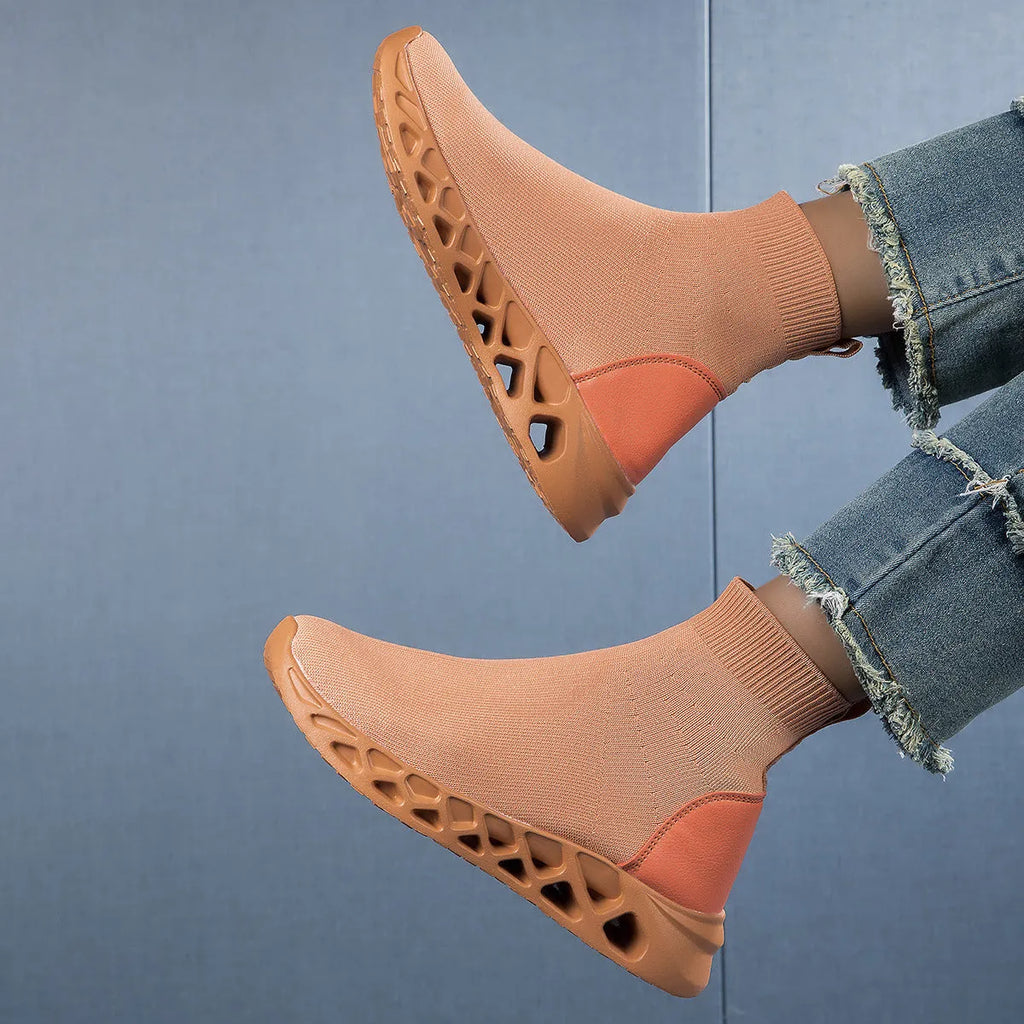 Women's low-top casual mesh slip-on shoe in terracotta colour on a white background.