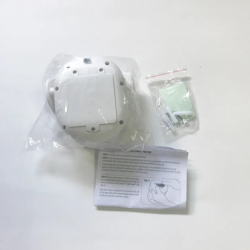 White Atomic Angel induction lamp with ABS plastic construction and 13.3cm dimensions