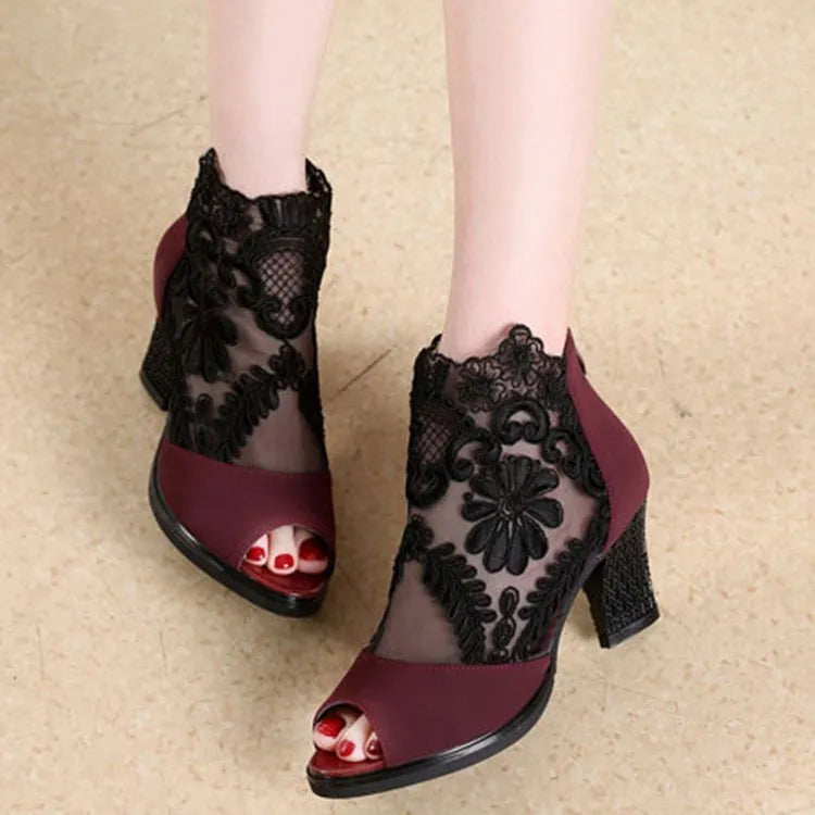 Women's black lace gladiator sandals with square high heels and zip closure