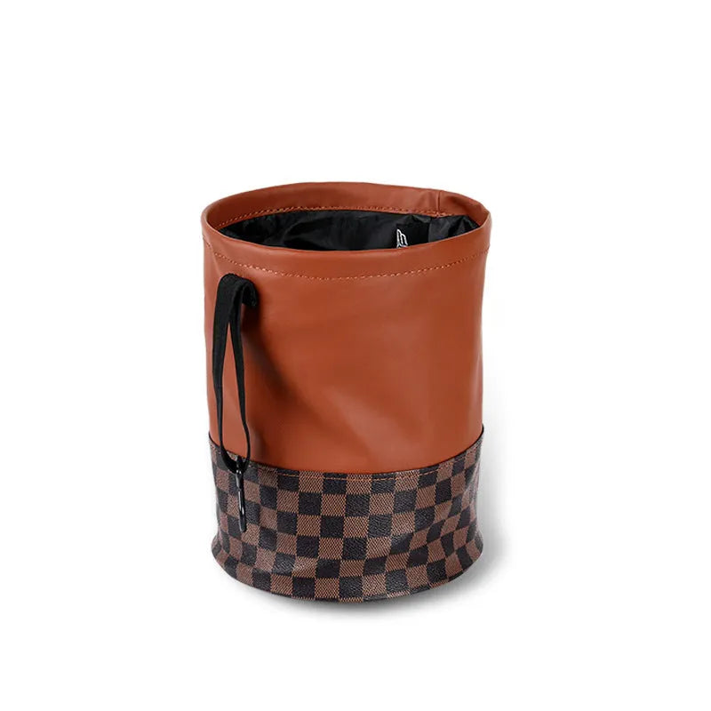 Retractable leather interior car trash can with handle, shown in colour as pictured.