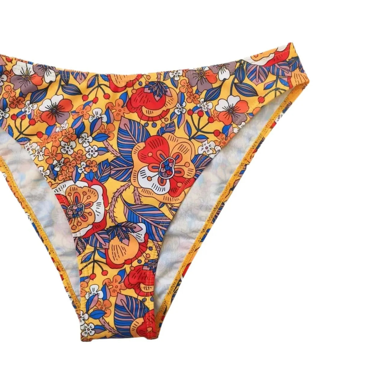 Plus size women's floral print strap bikini swimsuit two-piece set on a mannequin