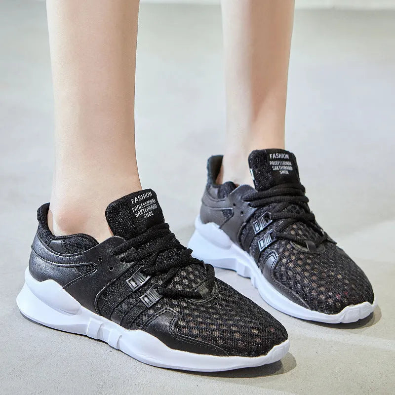 Breathable mesh casual sneakers with hollow-out design and round toe in black and white colour options