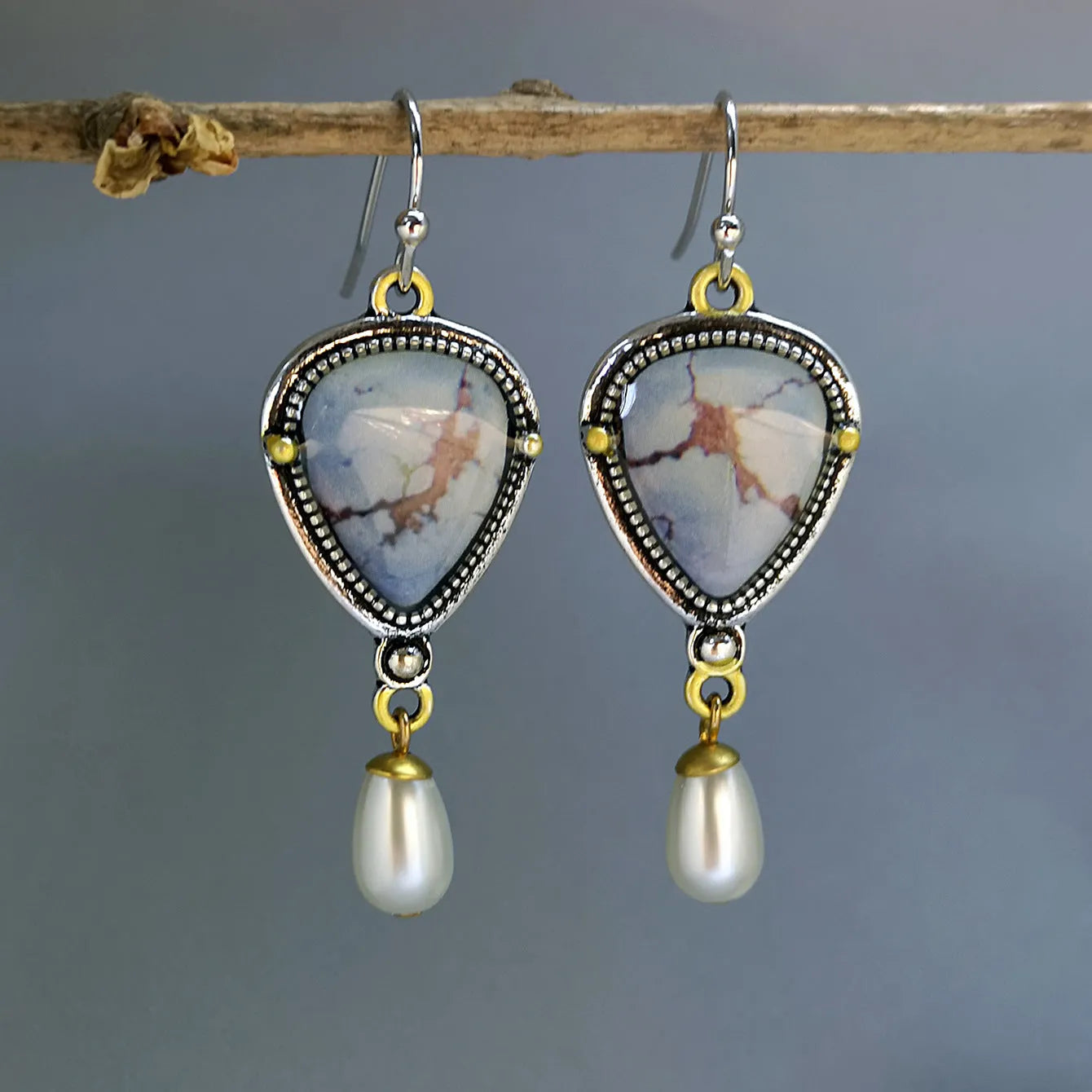 Retro blue electroplated drop earrings with geometric shape, synthetic blue opal and white pearl accents