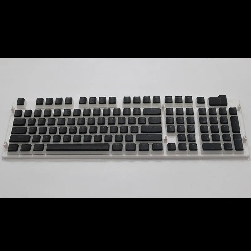 Set of 108 translucent PBT keycaps for mechanical keyboards in various colours on a white background.