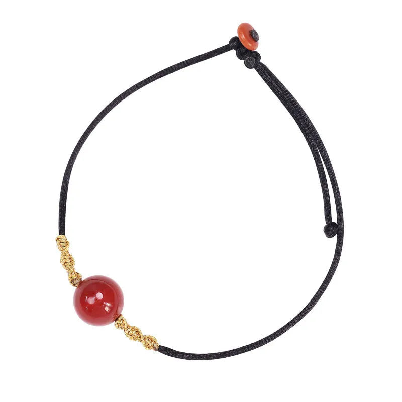 Women's natural red agate bracelet and necklace set with hand-woven construction and bean charms