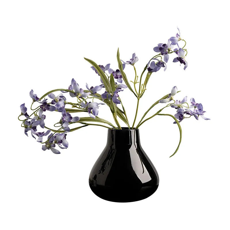 Ceramic vase with glass surface in black or white colour featuring coloured glaze finish and modern simple style