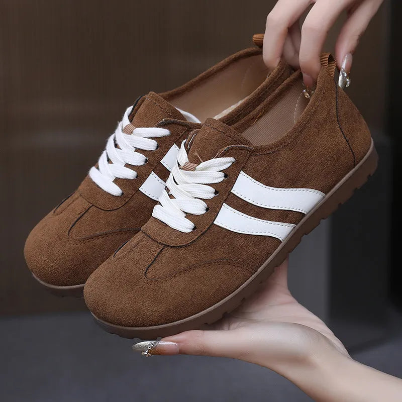 Women's vintage canvas sneakers in dark red, maroon, and khaki with round toe and flat rubber sole.