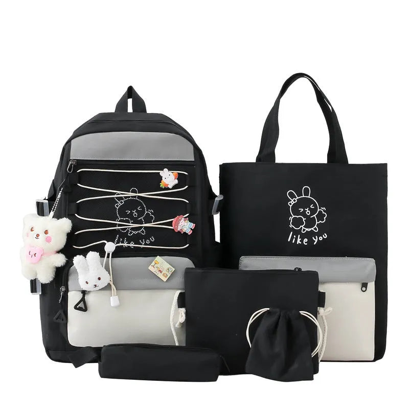 Lightweight large student backpack in black, blue, pink, and purple colour options.
