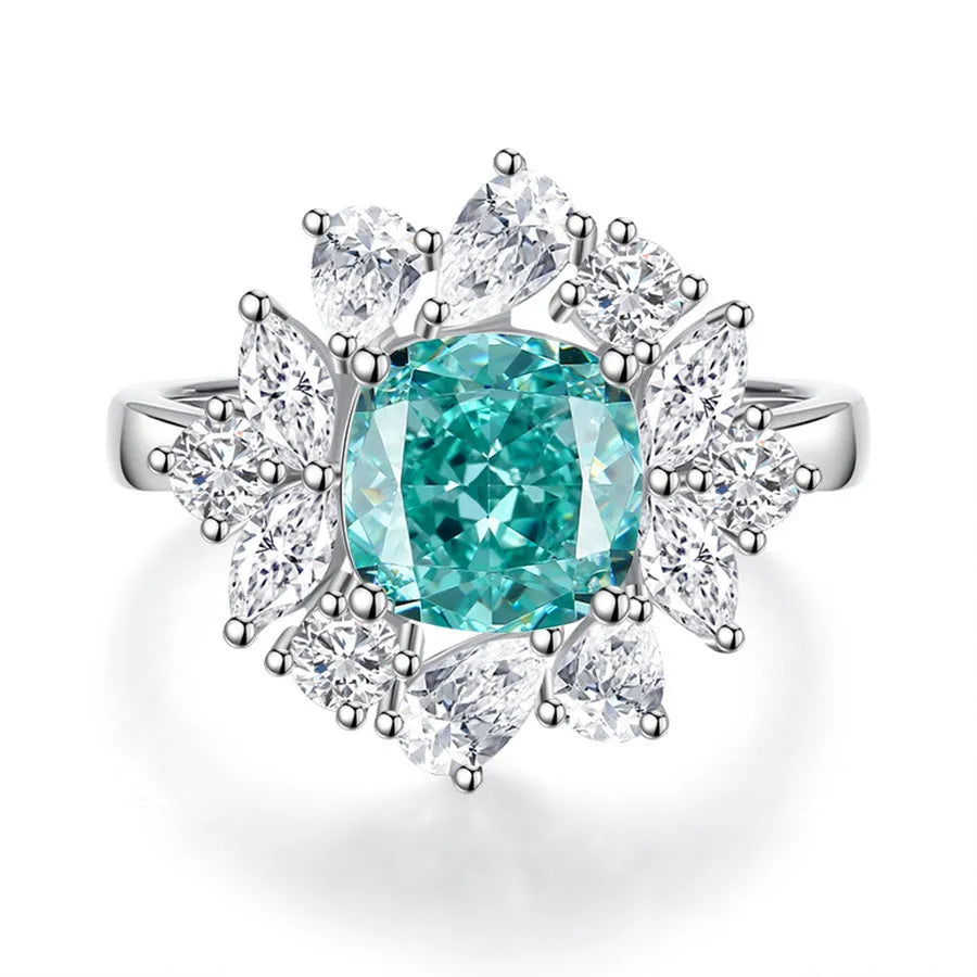 Geometric S925 sterling silver women's ring with an emerald cut stone and diamond inlay detail.