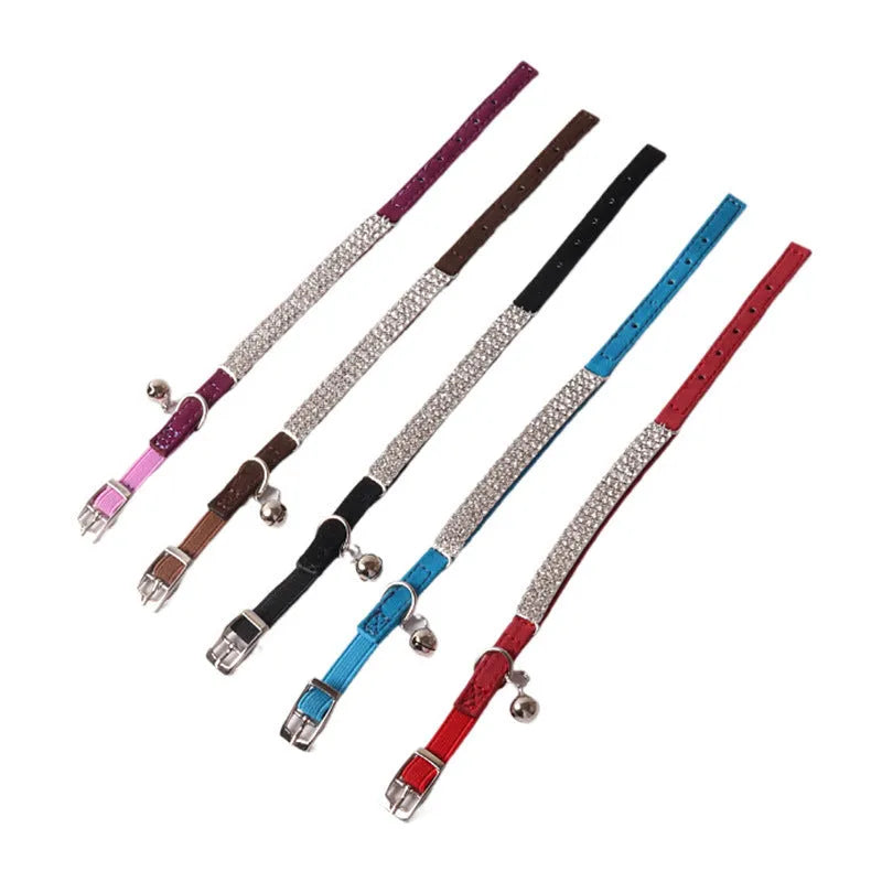 Flocked elastic buckle cat collar shown in multiple colours on a white background.