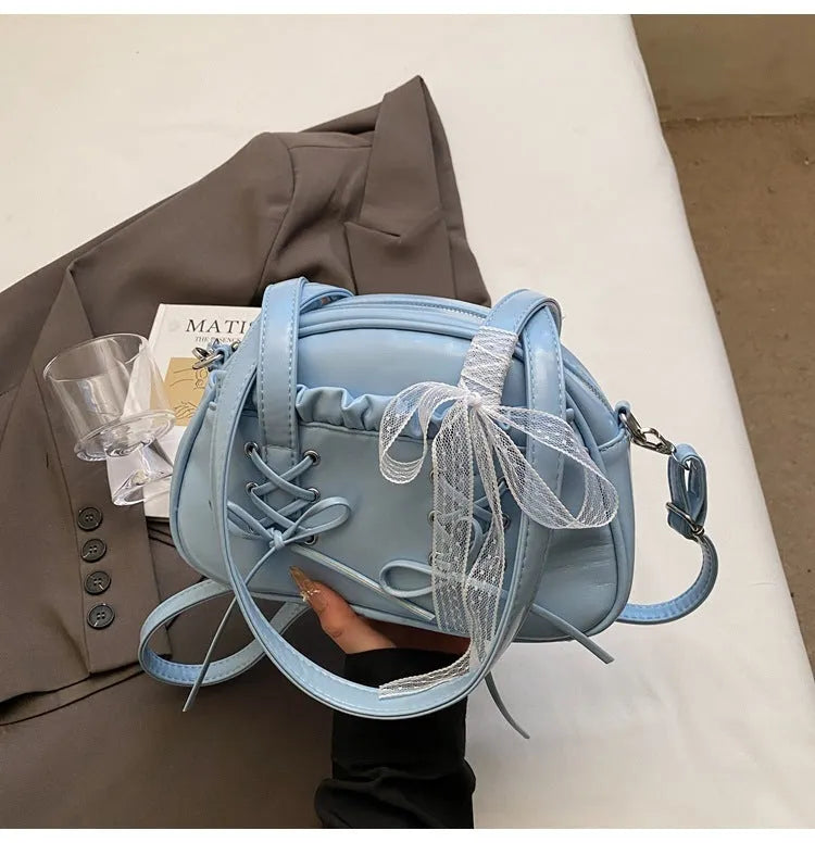 Women's casual shoulder handbag with bandage bow detail and PU leather in milky white colour