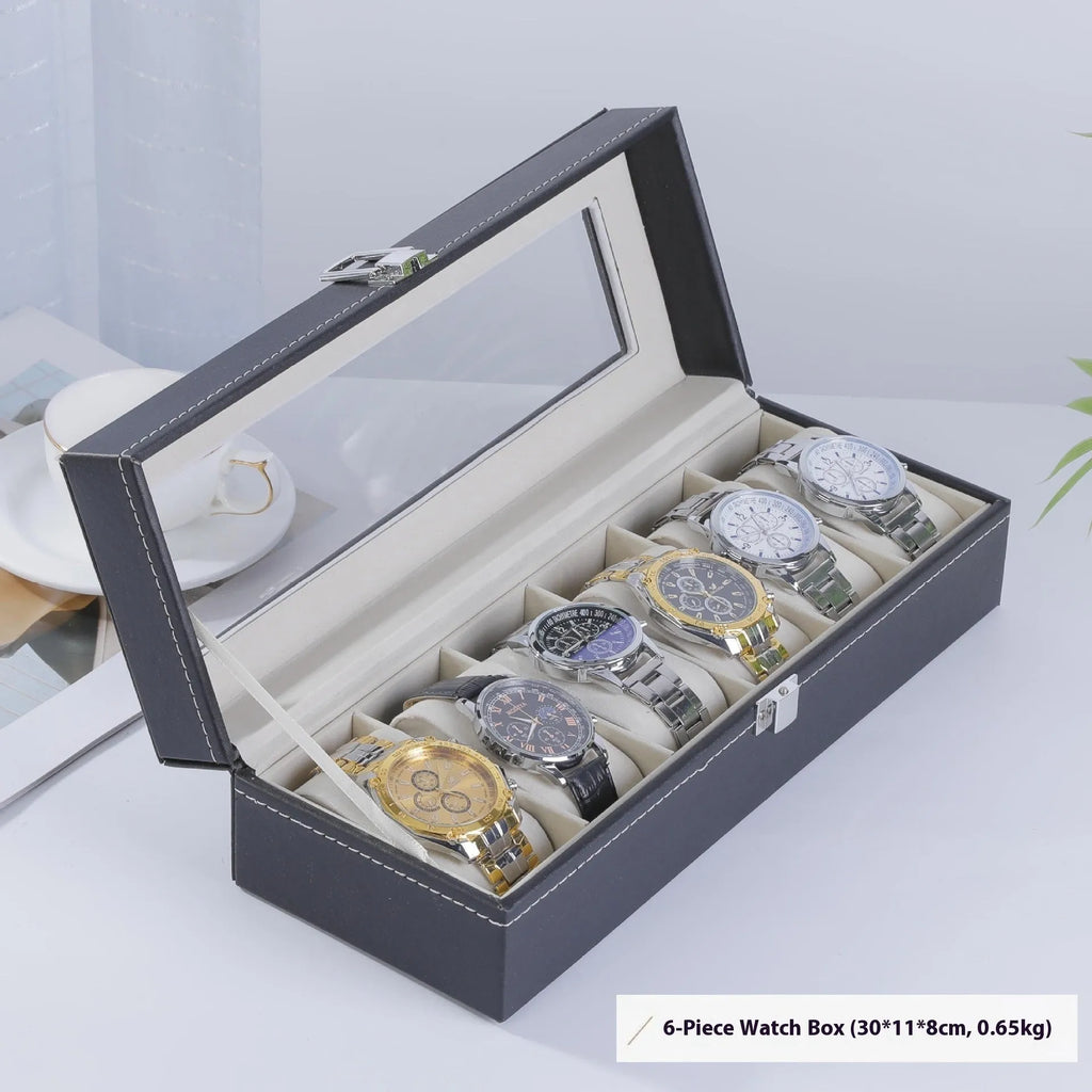Grey leather watch storage box with clear dustproof lid showing multiple watch slots inside.