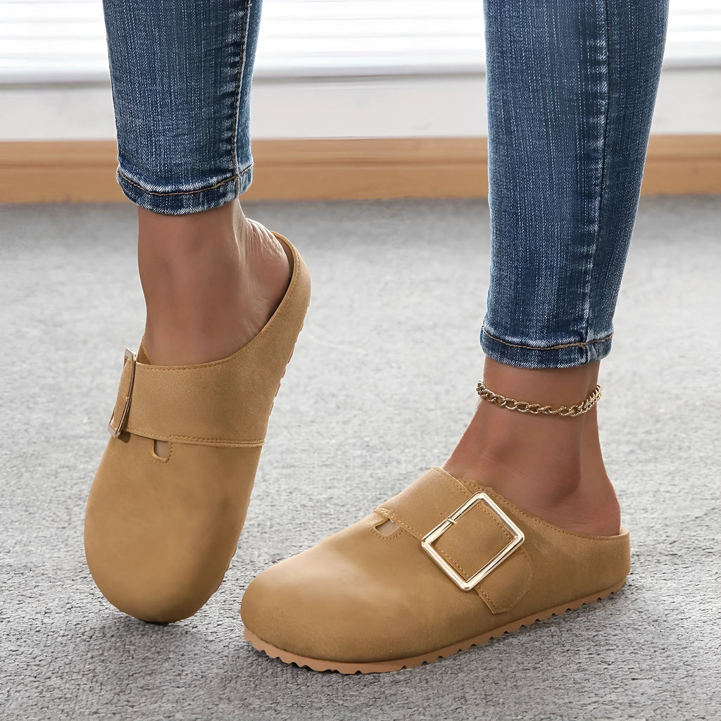 Women's closed toe canvas slippers in apricot colour showing low top design and canvas upper material
