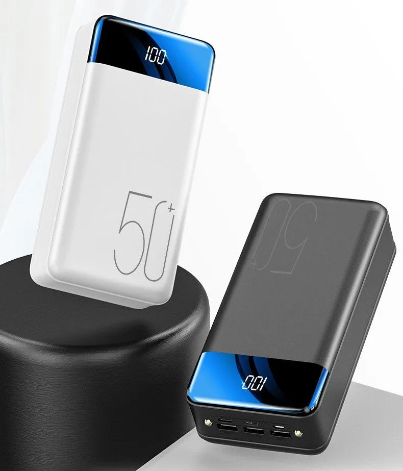 Large black or white 50000mAh power bank showing multiple USB ports on front.