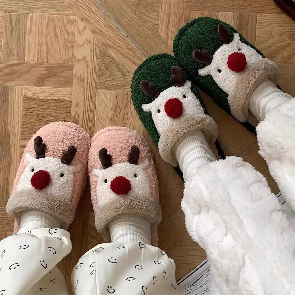 Women's Christmas deer design plush slippers with non-slip PVC soles in green, pink, and brown colours