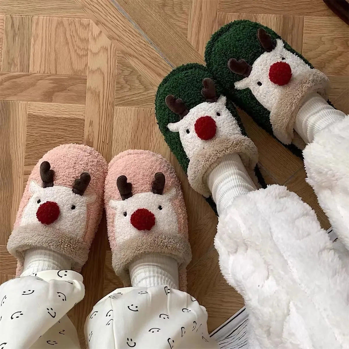 Women's Christmas deer design plush slippers with non-slip PVC soles in green, pink, and brown colours