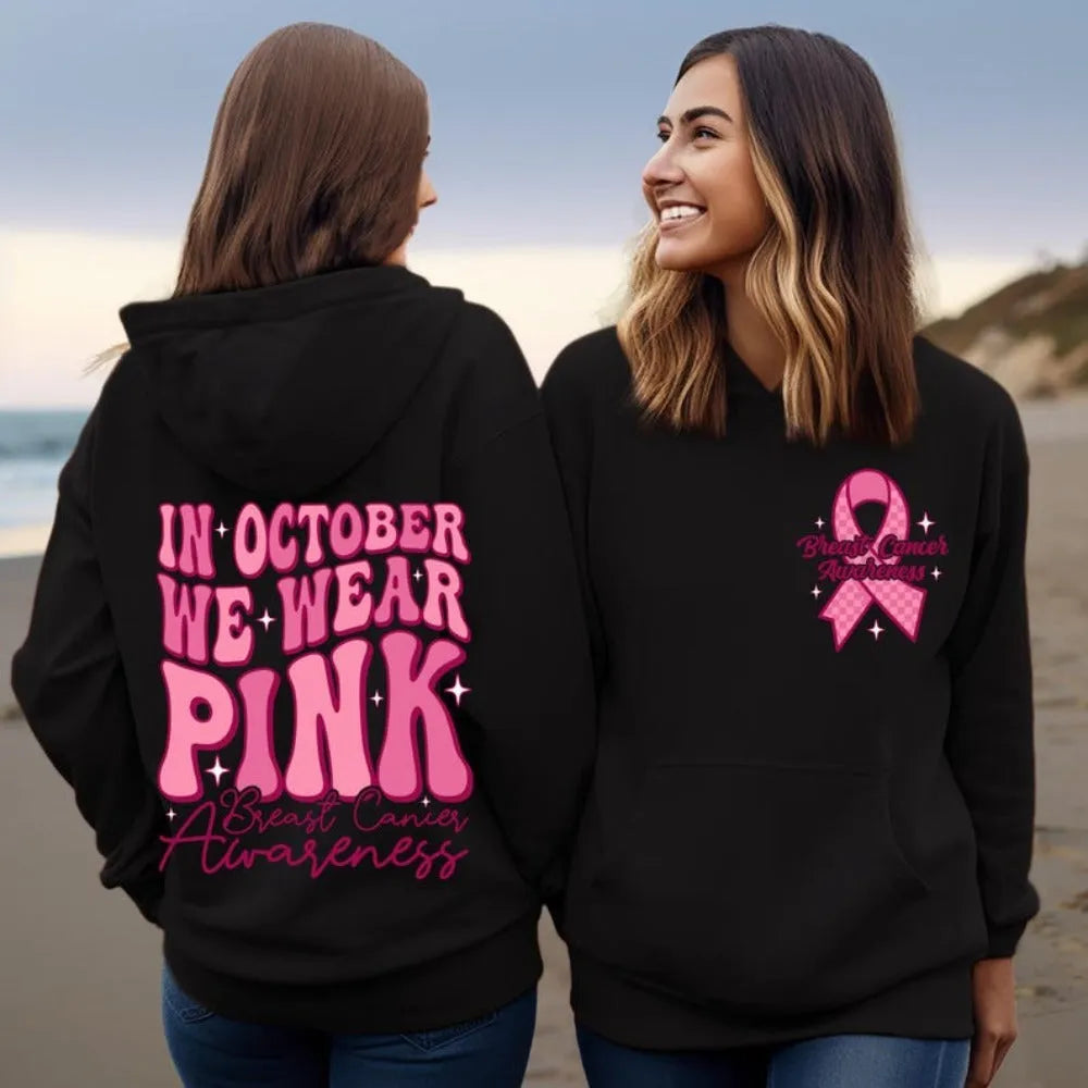 Breast Cancer Awareness pullover hoodie with retro print and side seam pockets in pink.