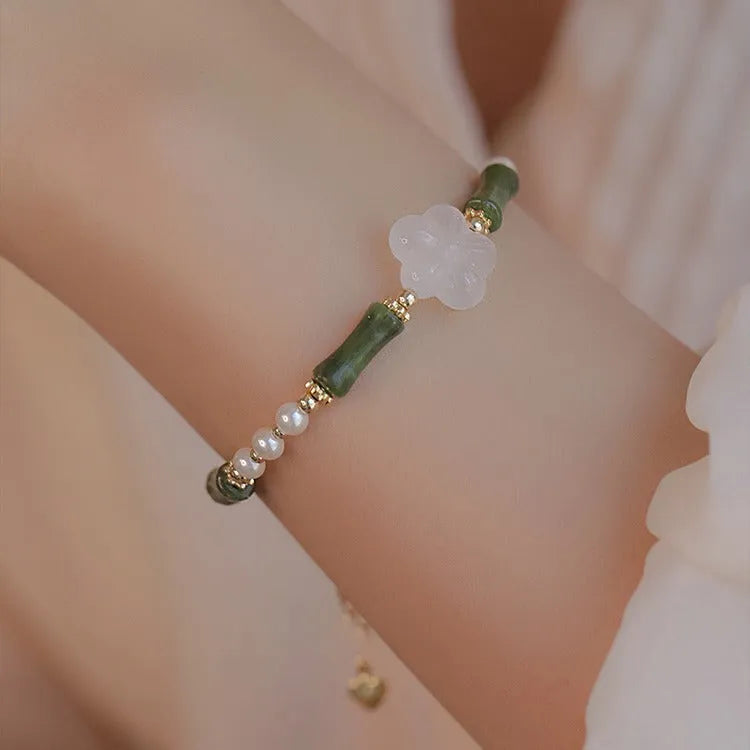 Chinese style olivine bracelet with Hetian jade and copper shell pearls featuring bamboo joint design
