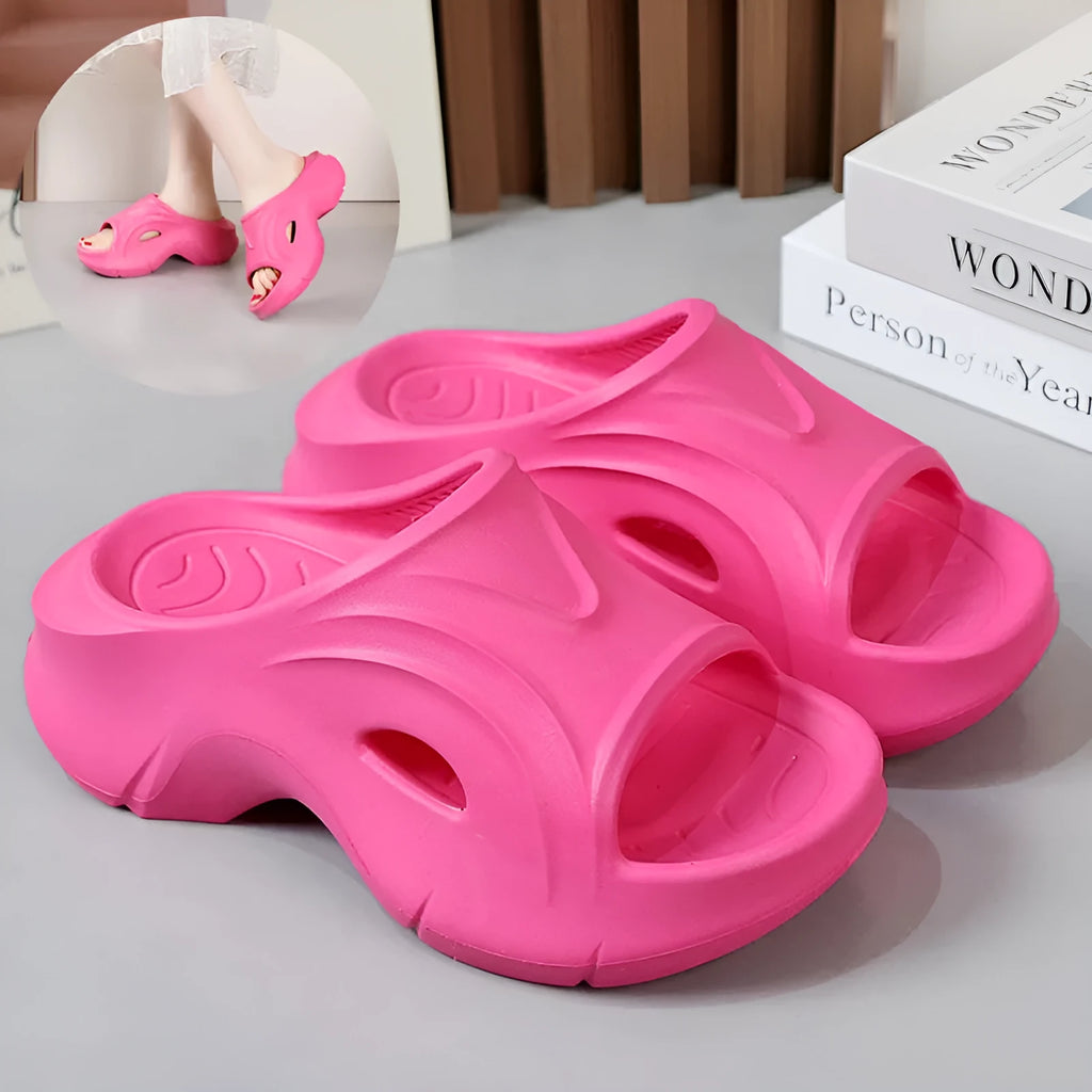 Women's white thick-soled EVA slippers with round toe for beach wear.