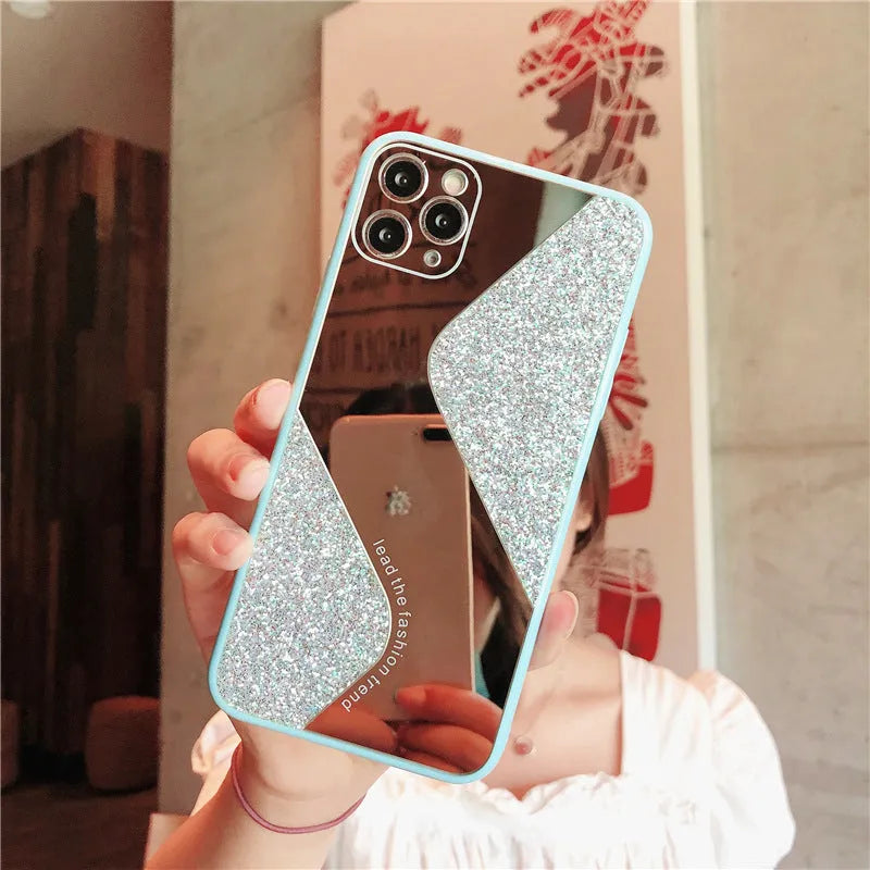 Glitter mirror iPhone case with rhinestones on a pink background, showing Black, Blue, and Pink colour options.